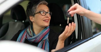Senior renting a car